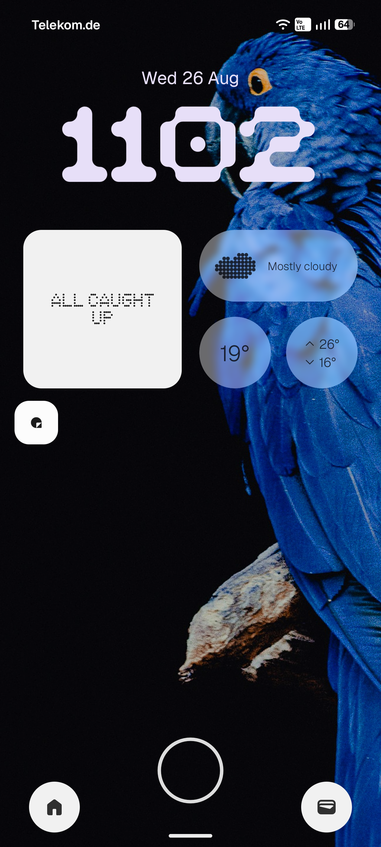 The lock screen with the Gooey clockface: 11:02 in a soft, rounded, blobby typeface, a dot-matrix ALL CAUGHT UP widget and translucent weather widgets over a blue macaw wallpaper.